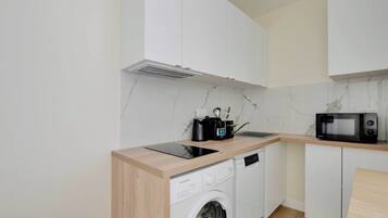 Apartment | Private kitchen | Fridge, microwave, stovetop, dishwasher