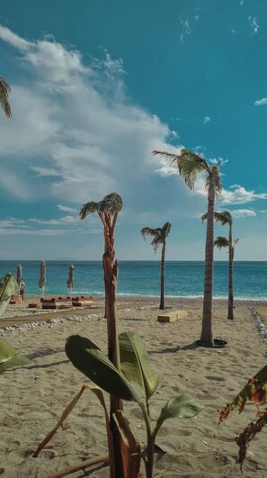 On the beach, beach towels