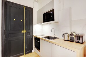 Apartment | Private kitchen | Fridge, microwave, stovetop, coffee/tea maker