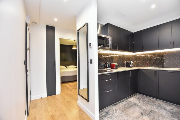 Apartment | Private kitchen | Fridge, microwave, stovetop, dishwasher