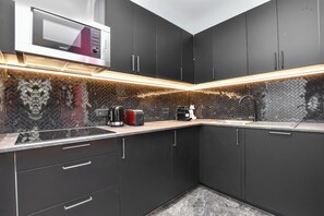 Apartment | Private kitchen | Fridge, microwave, stovetop, dishwasher