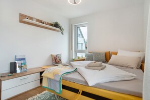 1 slaapkamer, een strijkplank/strijkijzer, wifi, beddengoed