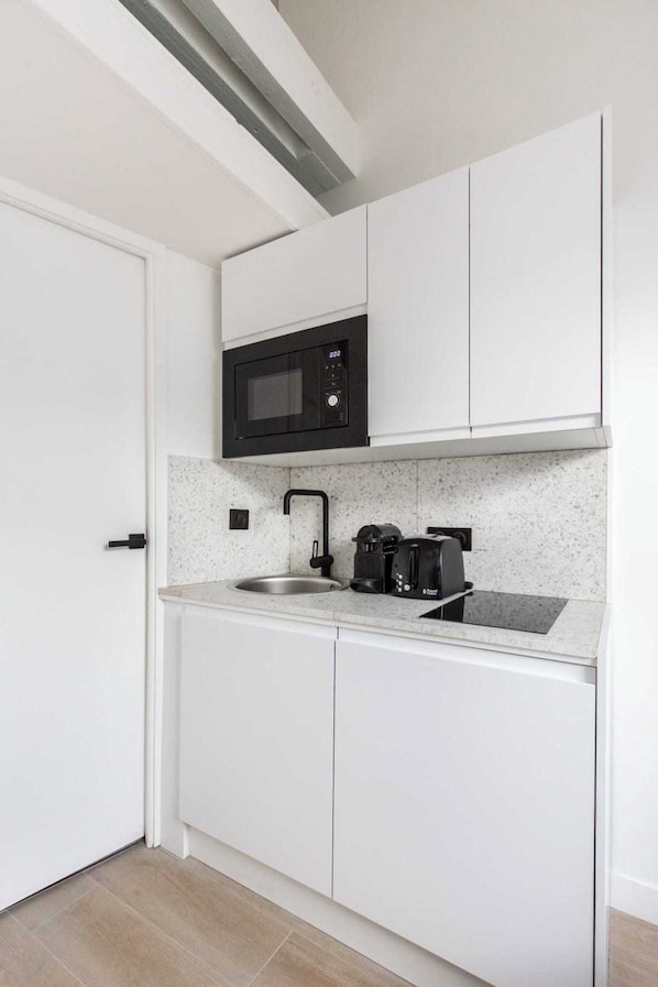Apartment | Private kitchen | Fridge, microwave, stovetop, coffee/tea maker