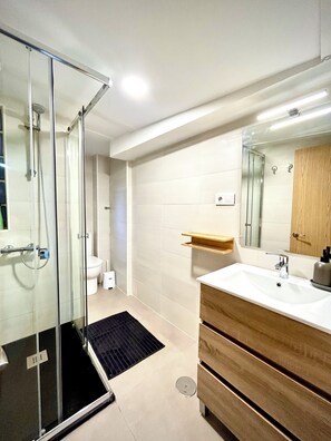 Hair dryer, towels, soap, toilet paper