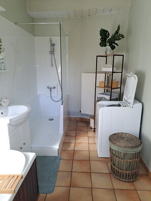 Shower, hair dryer, towels, soap
