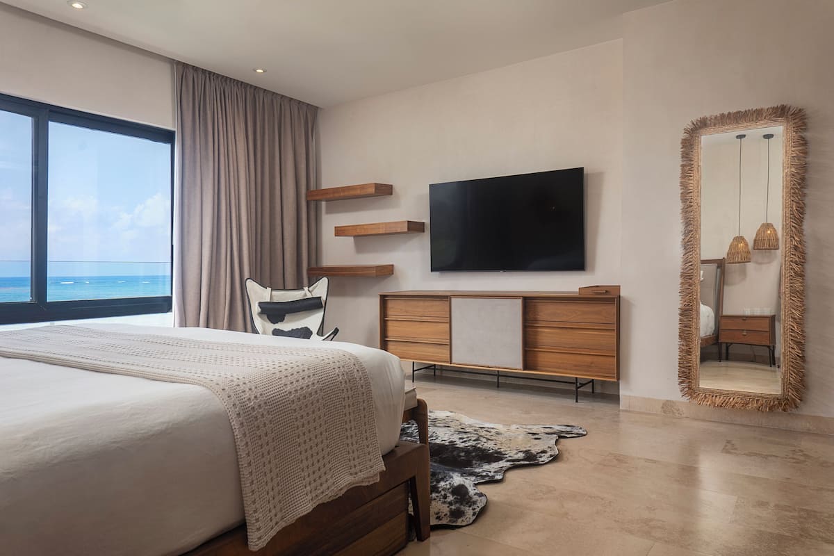 Departamento Elite, vista a la playa | Caja de seguridad en la habitación y decoración personalizada