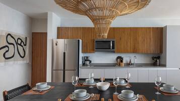 Apartament Deluxe, vistes a la platja | Menjador