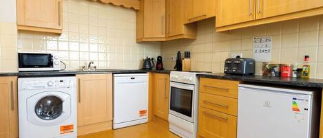 Fridge, microwave, dishwasher, coffee/tea maker