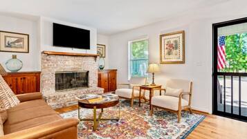 Smart TV, fireplace, books