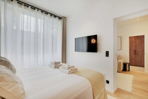 شقة | 2 عدّة غرف نوم ومساحة عمل للكمبيوتر المحمول ومكواة/لوح كي وملاءات أسرّة