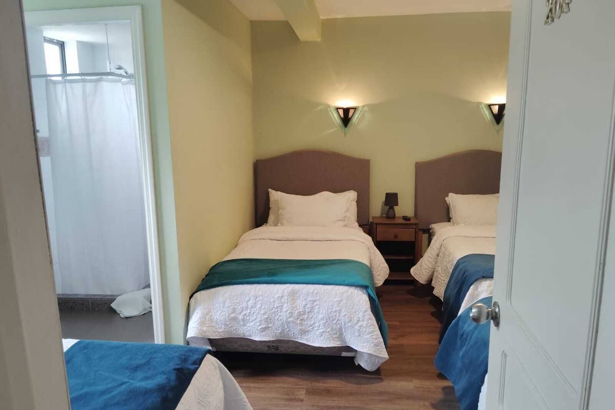 Family Quadruple Room, City View | Desk, laptop workspace, free WiFi