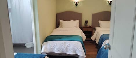 Family Quadruple Room, City View | Desk, laptop workspace, free WiFi