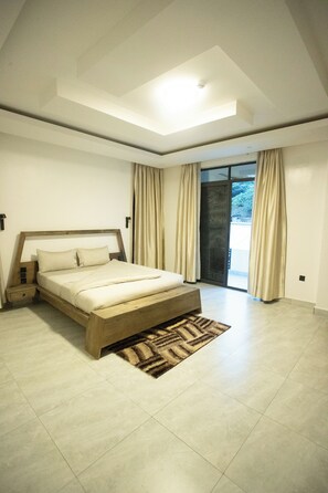 Classic Apartment, City View | Pillowtop beds, individually decorated, individually furnished, desk - Gratia Residence (Kigali)