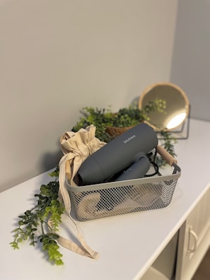 Hair dryer, towels, soap, shampoo