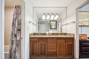 Rich wood cabinetry and soft lighting for a spa-like retreat
 NAP-B13 - Napili Point | Oceanfront 3 BR, Sleeps 10 | Car Incl. w/ 6+ Nights | NAP ML-1550 by KBM (Lahaina)