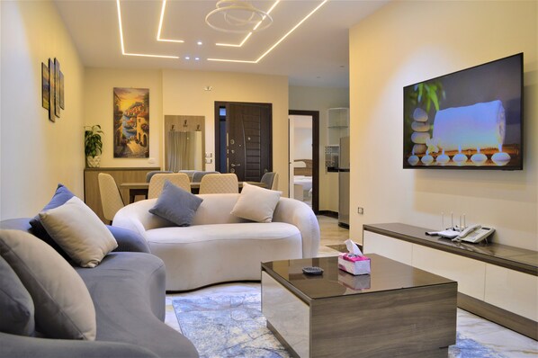 Deluxe Apartment, 3 Bedrooms | In-room safe, desk, laptop workspace, soundproofing