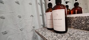 Hair dryer, towels, soap, toilet paper