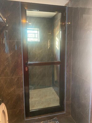 Deluxe House, Lake View | Bathroom | Shower, slippers, towels, soap - Capricorn by Quest (Cape Maclear)