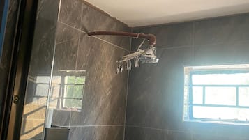 Deluxe House, Lake View | Bathroom | Shower, slippers, towels, soap