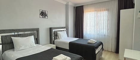 Blackout curtains, iron/ironing board, free WiFi