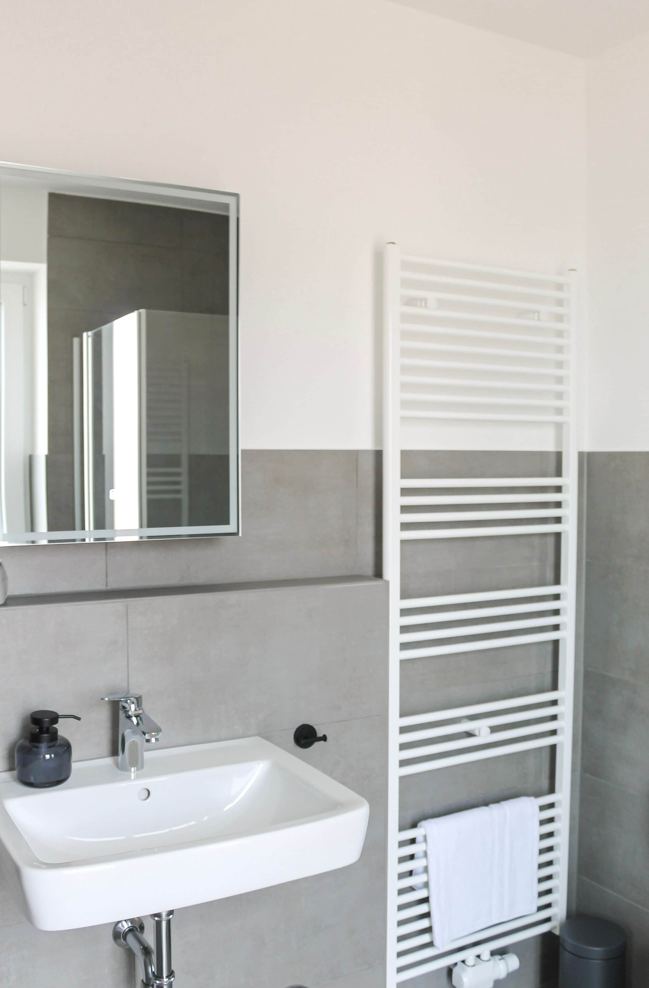 Shower, hair dryer, towels, toilet paper