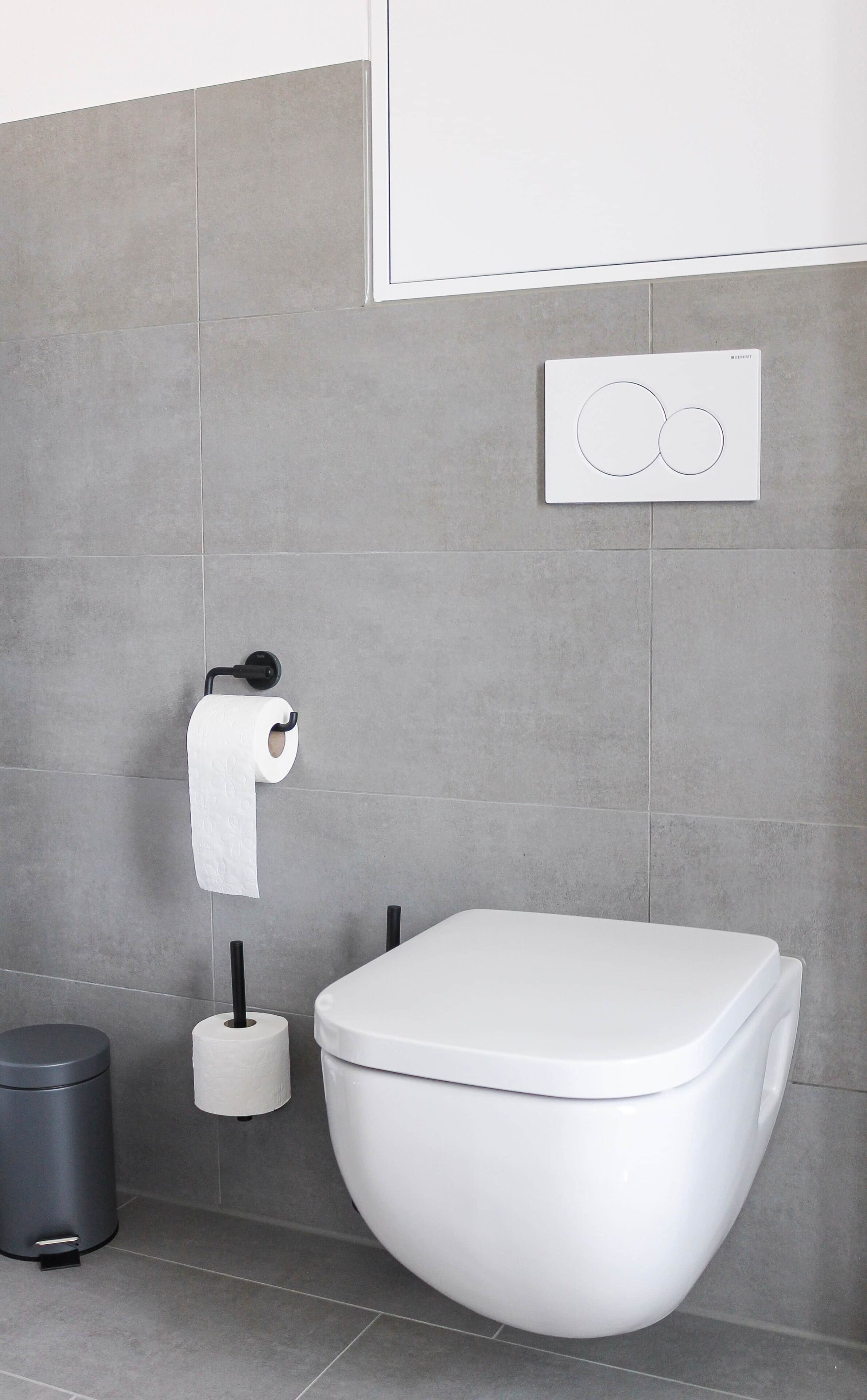 Shower, hair dryer, towels, toilet paper
