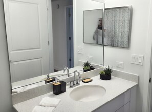 Hair dryer, towels, soap, toilet paper