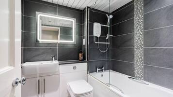 Hair dryer, towels, soap, shampoo