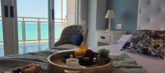 Beachfront house with fantastic views, full kitchen and quality wifi.