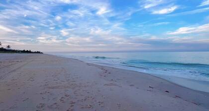 Island living, steps to your own private beach! Beautiful home sleeps 6-8.