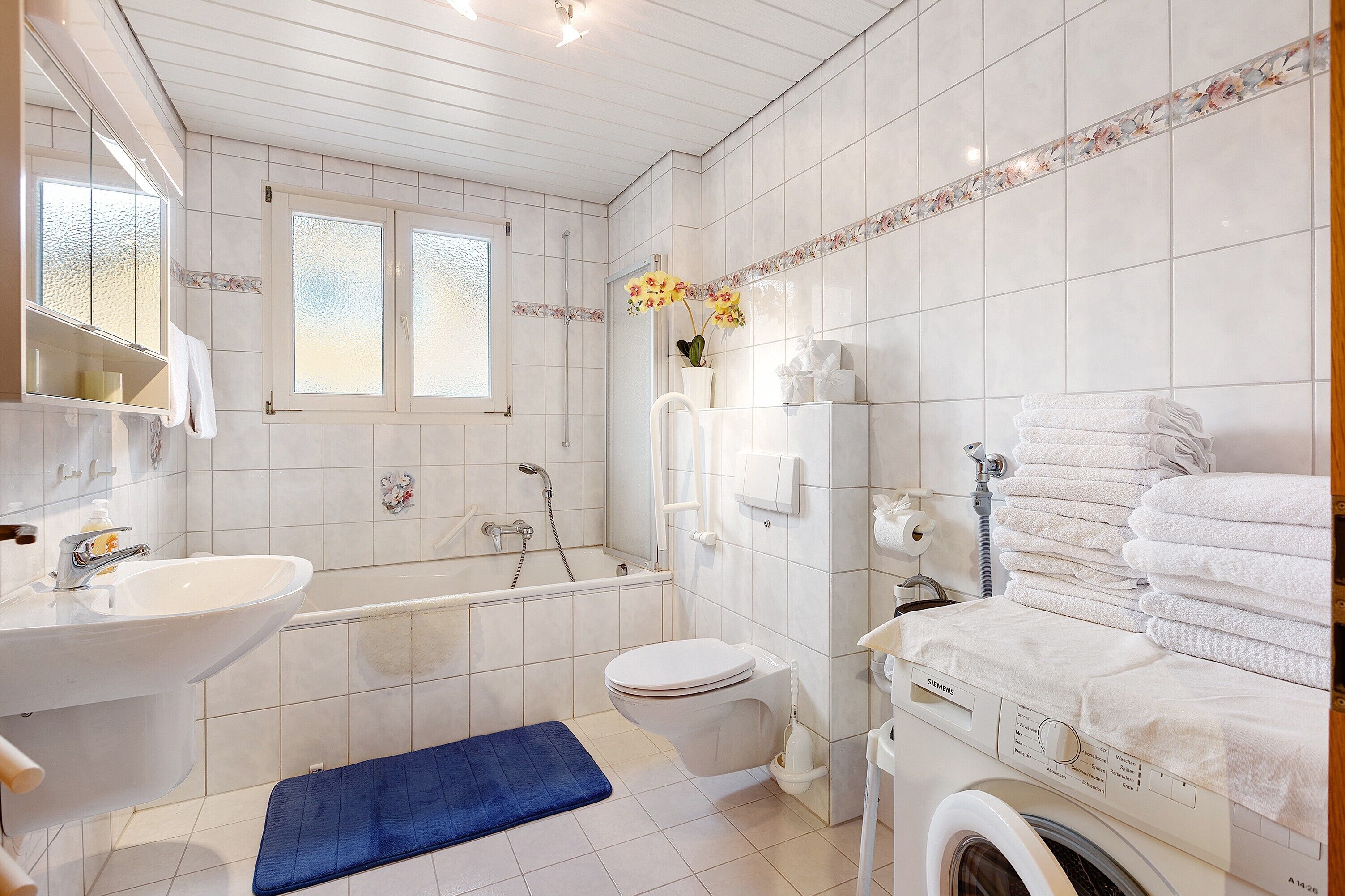 Een douche, een haardroger, handdoeken