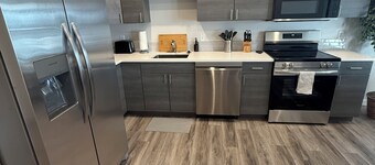 Brand new construction, stylish 3BR/2BA apartment in Laramie 1 blk from campus