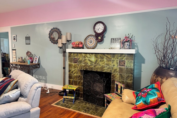 Our home is full of warm colorful art and antiques.