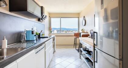 Modern 2BR • Sunset View over Vosges • Full Kitchen • Netflix & Parking