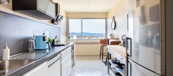 Modern 2BR • Sunset View over Vosges • Full Kitchen • Netflix & Parking