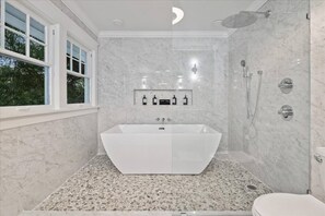 Shower, hair dryer, towels, soap