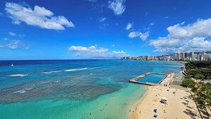 On the beach, sun-loungers, beach towels