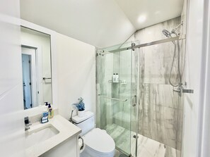 Hair dryer, towels, soap, shampoo