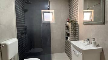 Hair dryer, towels, soap, toilet paper