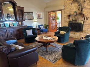 TV, fireplace, books