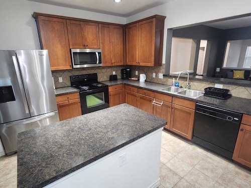 Spacious 3 bedroom, 2-bathroom home blends quaint charm with modern comfort.