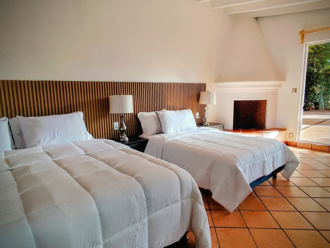 Down comforters, Select Comfort beds, laptop workspace, blackout drapes