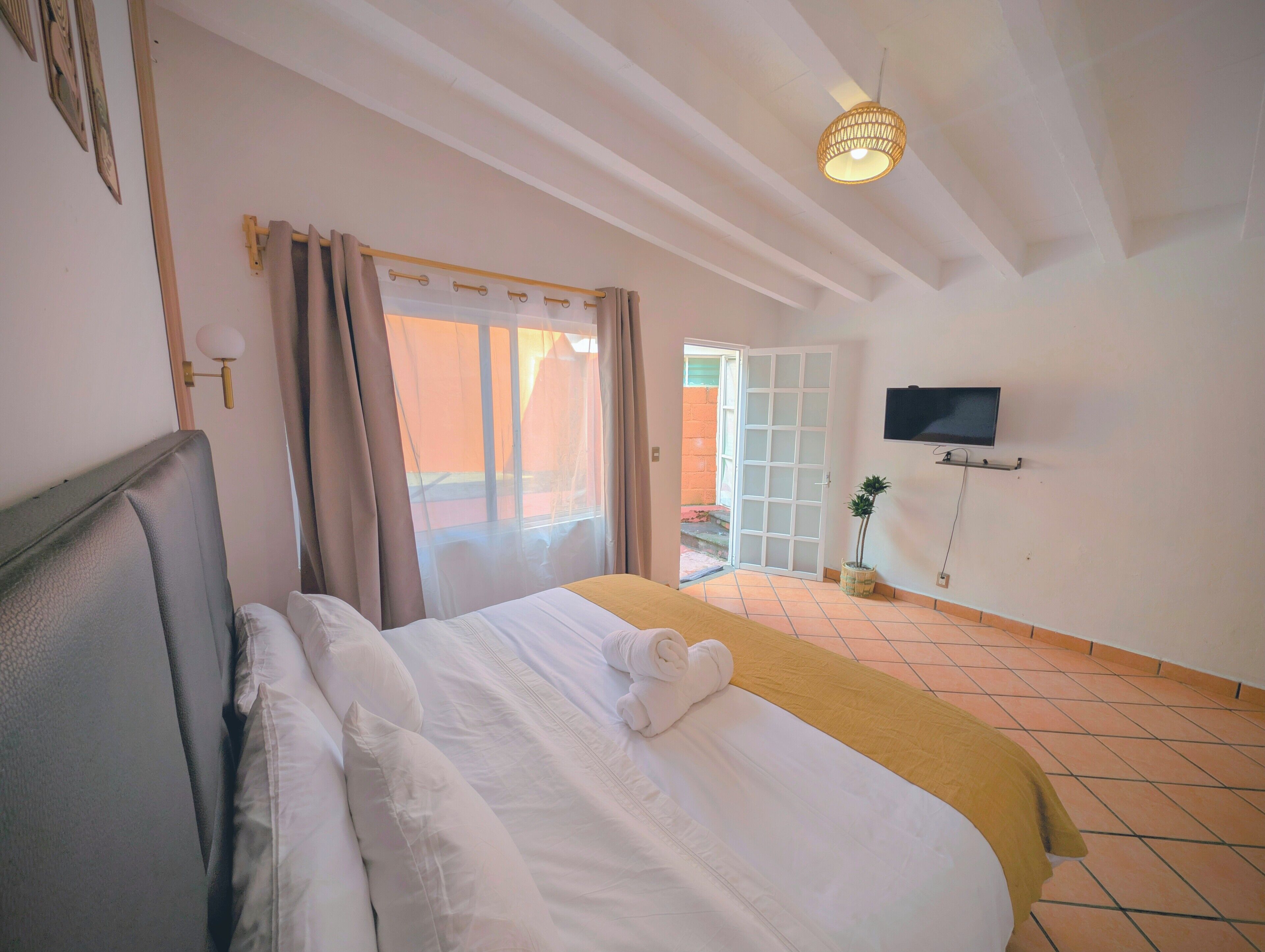 Deluxe Room, Garden View | Down comforters, Select Comfort beds, laptop workspace, blackout drapes