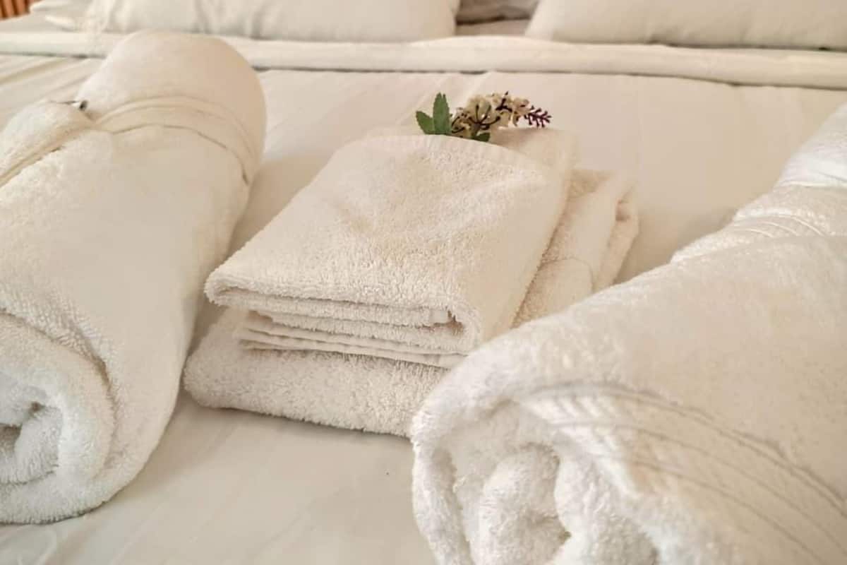Down comforters, Select Comfort beds, laptop workspace, blackout drapes
