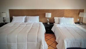 Edredón, camas Select Comfort y espacio para trabajar con laptop 