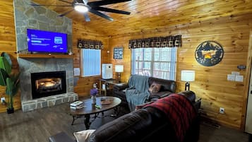 Smart TV, fireplace, foosball, books