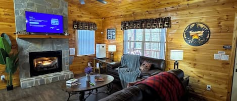 Smart TV, fireplace, table football, books
