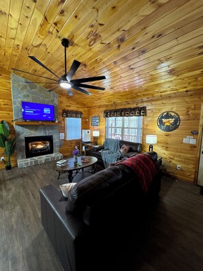 Smart TV, fireplace, foosball, books