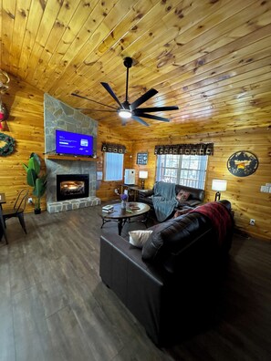 Smart TV, fireplace, foosball, books