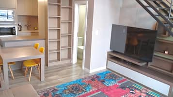 Apartamento Confort, vistas a la ciudad | Zona de estar